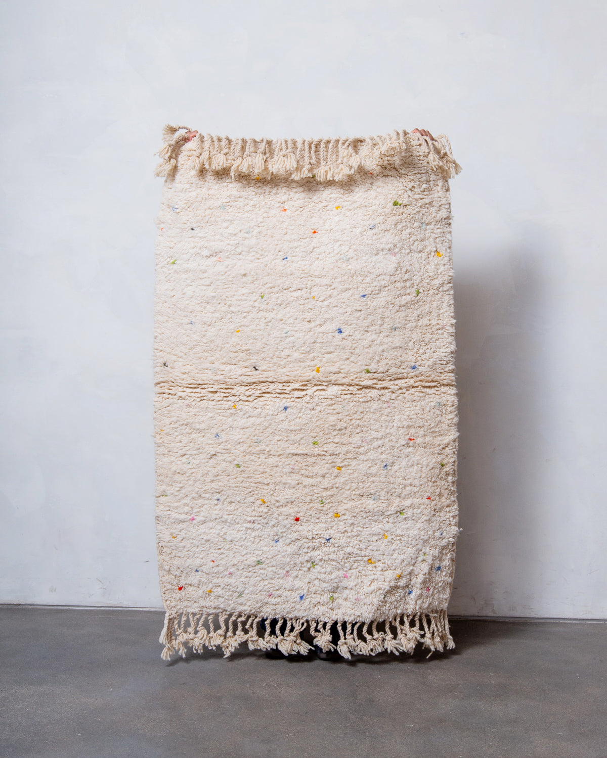 Modern, designer, handcrafted Berber rug from Morocco. Beniourain carpet with beautiful colours and patterns and fluffy wool texture.
